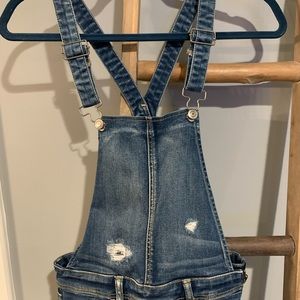 American Eagle women’s overalls size 4 distressed jegging